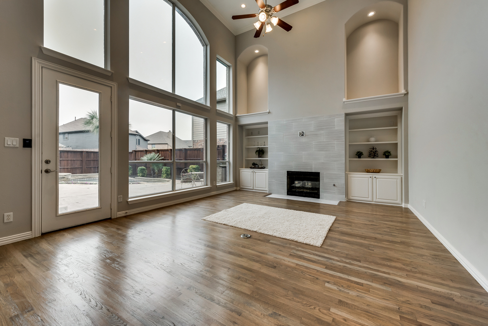    Modern Tile Gas Log Fireplace with Flat Screen TV Connection and Flanked by Built In Cabinetry 