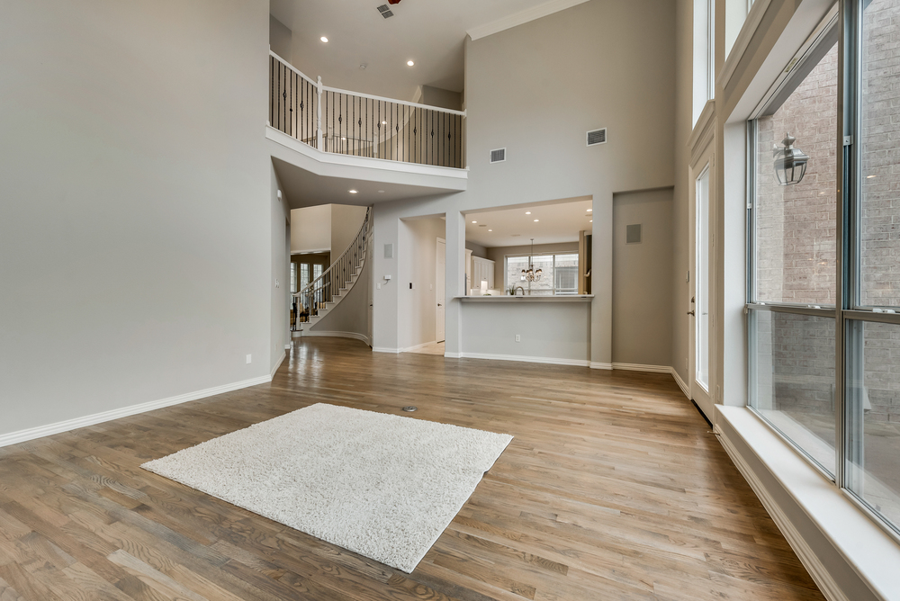    Family Room with Freshly Stained Hardwood Floors and Surround Sound 