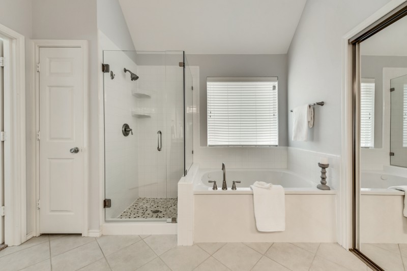    Spa Like Master Bath with Seamless Shower and Jetted Tub 