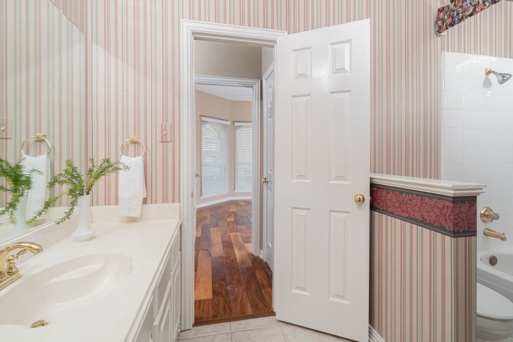    Full Bathroom with Bedroom and Hall Access   Has Granite Countertop Cut for this Room but not Installed 