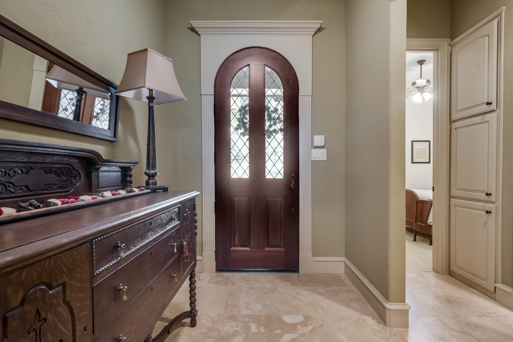    Custom Glass and Wrought Iron Inlaid Front Door 