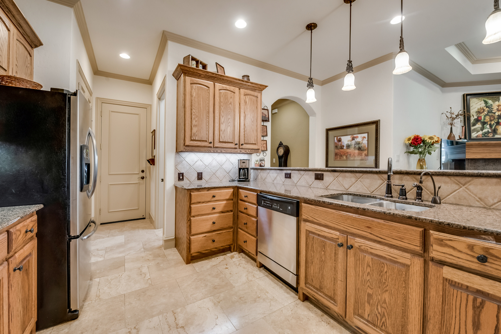    Gourmet Kitchen also includes Granite Countertops and undermount Lighting 