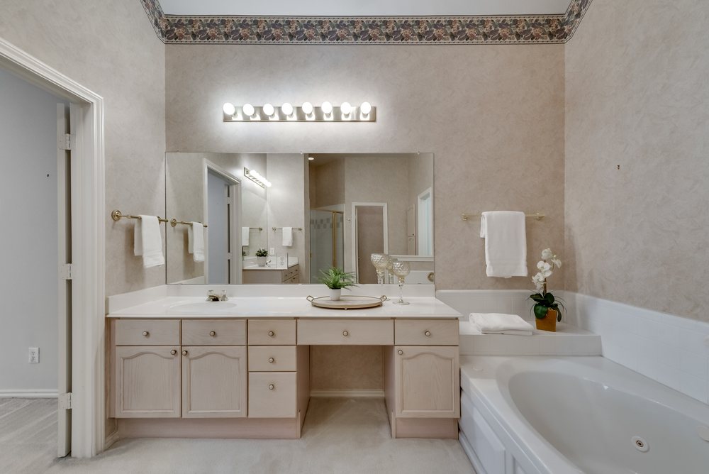    Master Bathroom with Jetted Tub Separate Vanities Separate Shower and Walk In Closet 