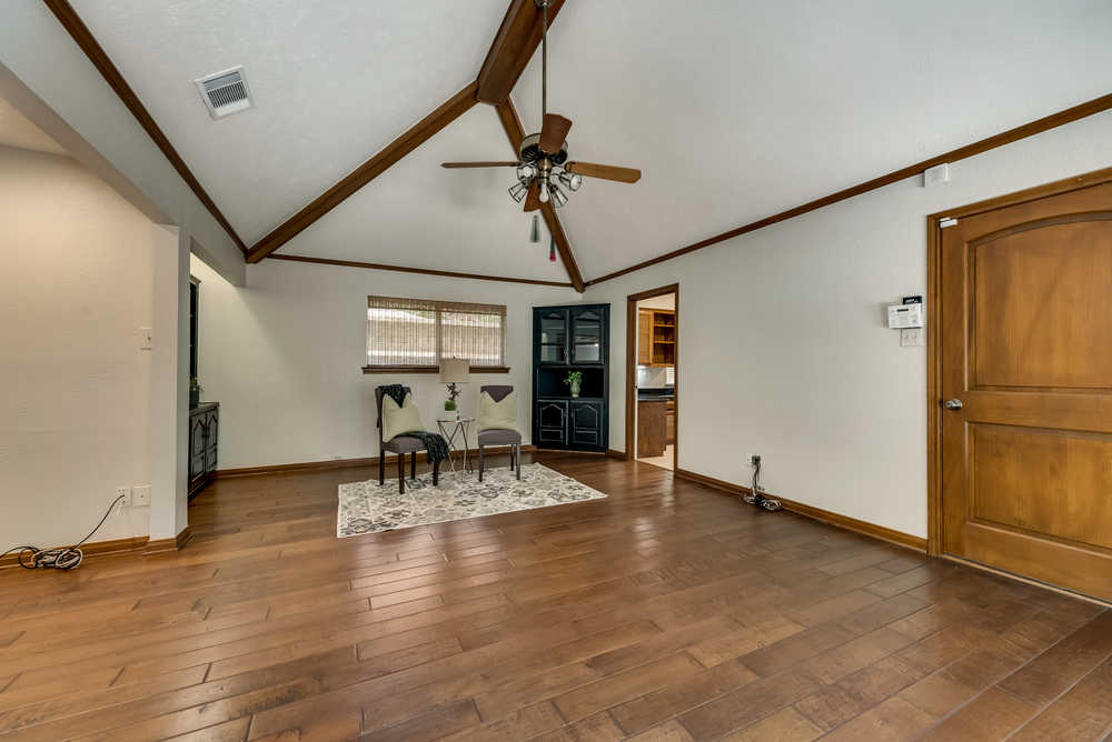   Family Room features   Built In Cabinets and Stunning Ceiling Details 