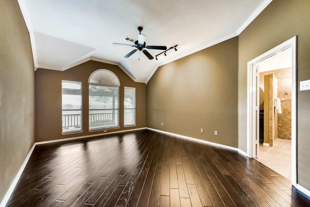    Private master suite has hardwood floors vaulted ceiling and golf course views 
