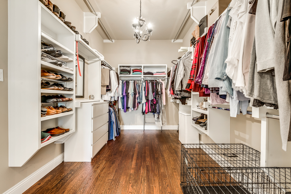    Custom Walk In Closet with Door to Laundry 
