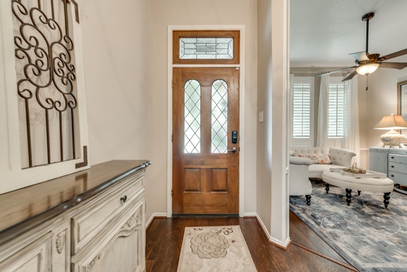    Gorgeous Entry with Lead Glass Inlaid Front Door and Transom Window 