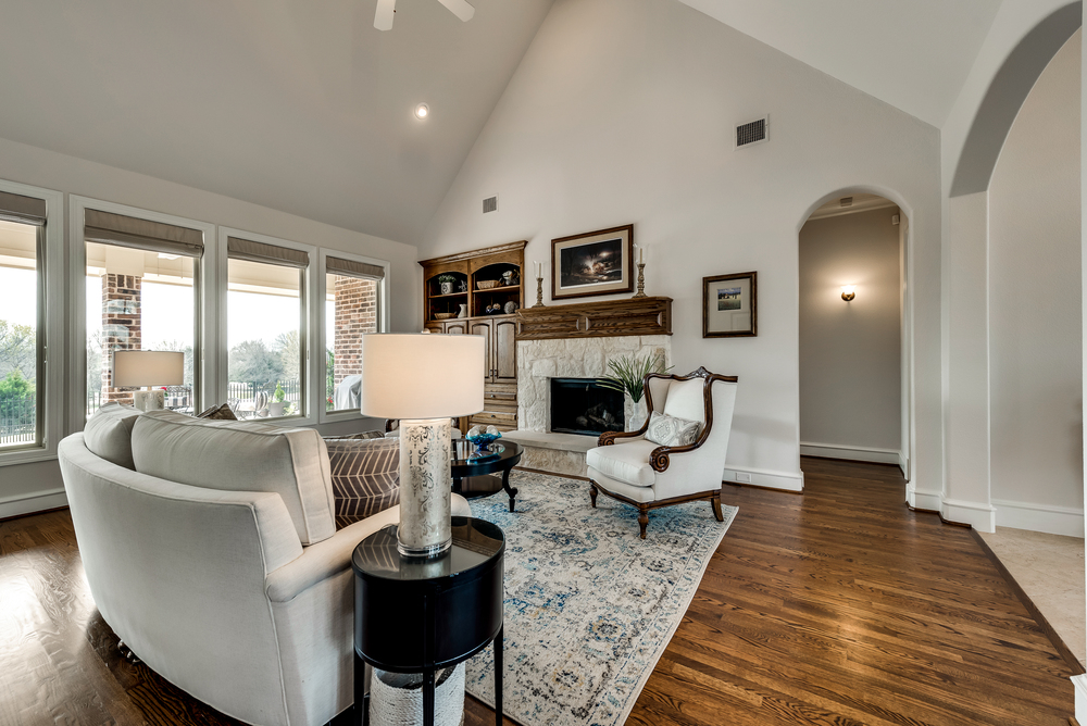    Inviting Family Room with Stone Gas Log Fireplace 