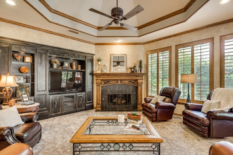    Rich Family Room with Stunning Tray Ceiling 