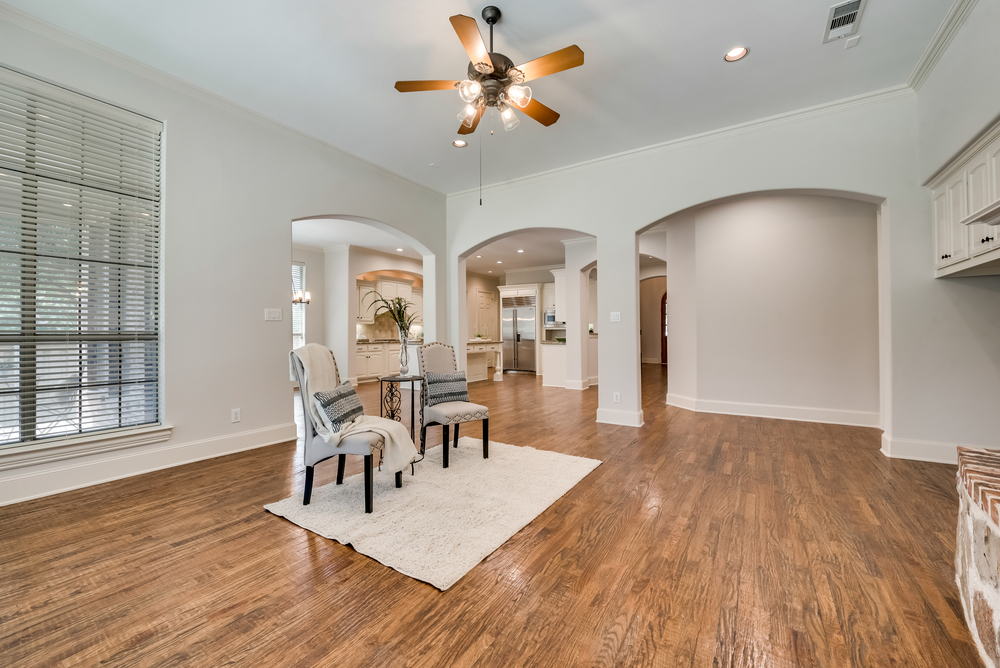    Family Room includes Hand Scraped Hardwoods and Crown Molding 
