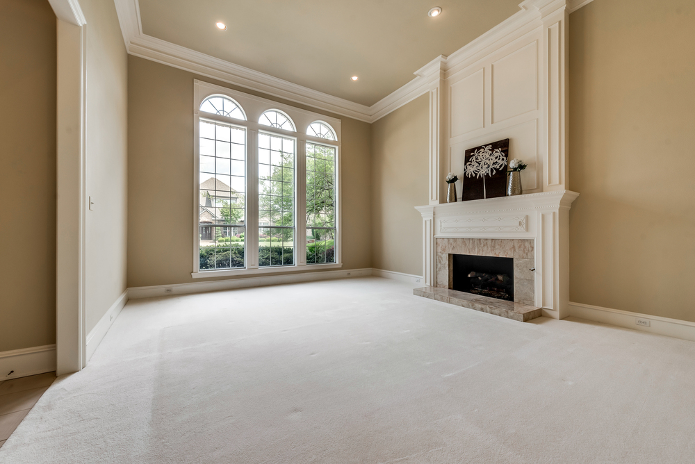    Formal Living has Soaring    ft Ceilings and Gorgeous Fireplace 