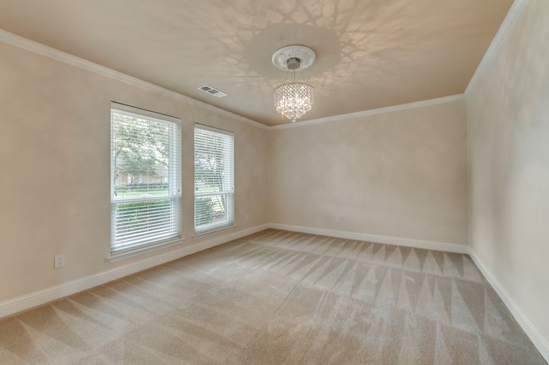    Formal Dining has Gorgeous Crystal Light Fixture 