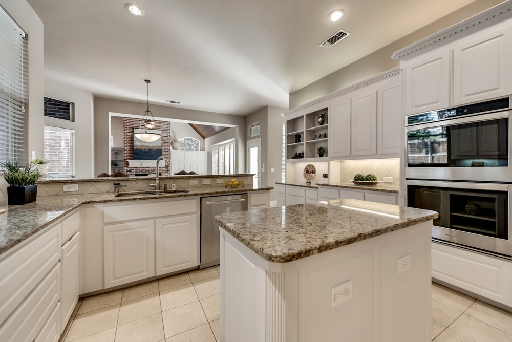    Gourmet Kitchen also has Stainless Steel Appliances including   Burner Gas Cooktop and Double Ovens 