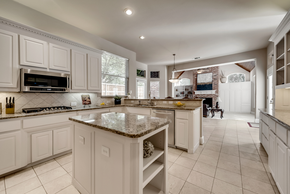    Gourmet Kitchen also features Island and Breakfast Bar for Additional Seating 