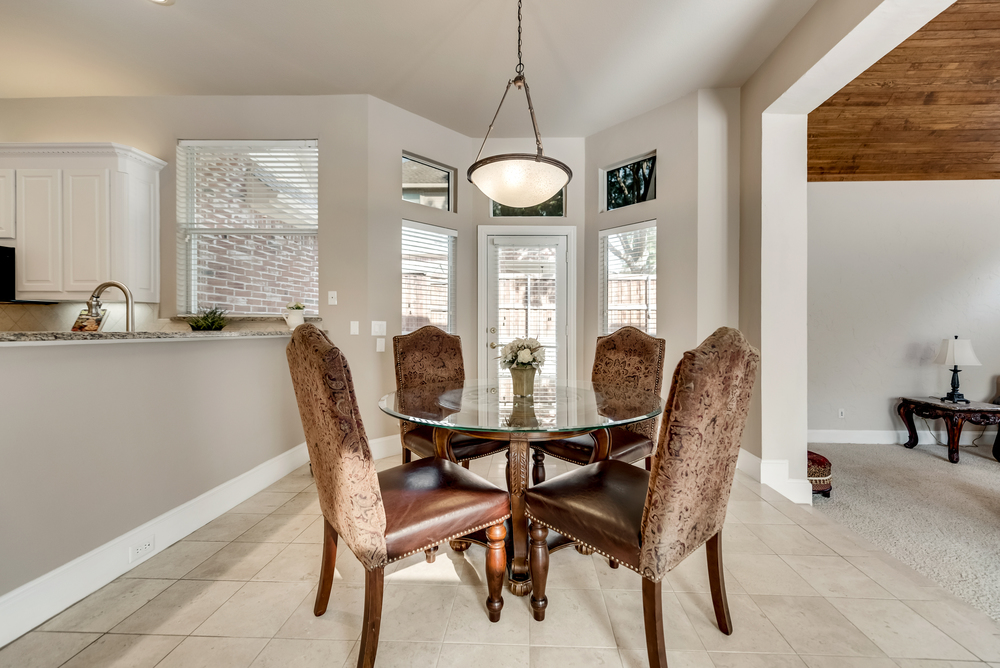    Charming Breakfast Area has Patio and Backyard Access 
