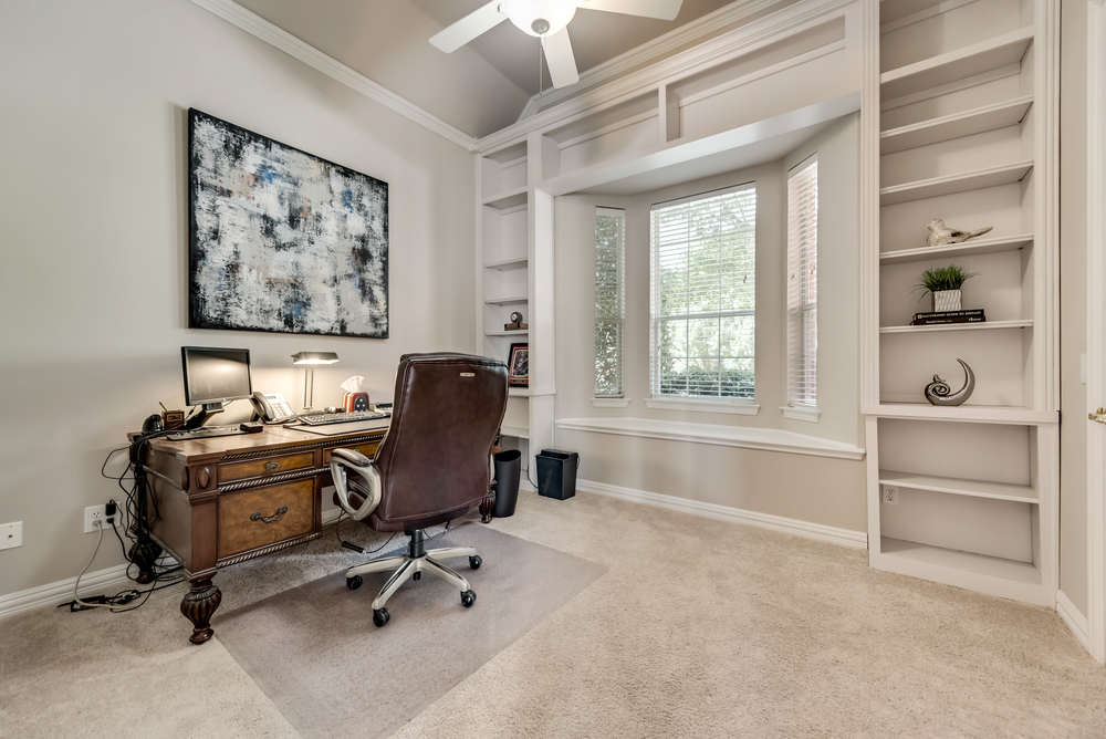    Second Bedroom on Main with Built In Shelving and Walk In Closet Works well as Private Study 