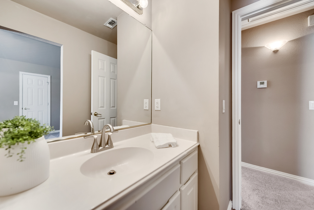    Jack and Jill Bathroom with Hall and Bedroom Access 