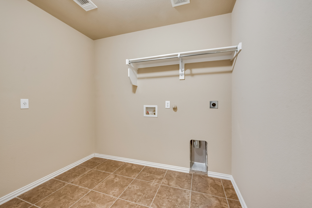    Utility Room for Full Size Washer and Dryer and Fridge 