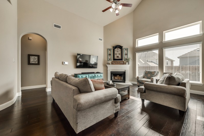    Inviting Family Room with Cast Stone Fireplace 