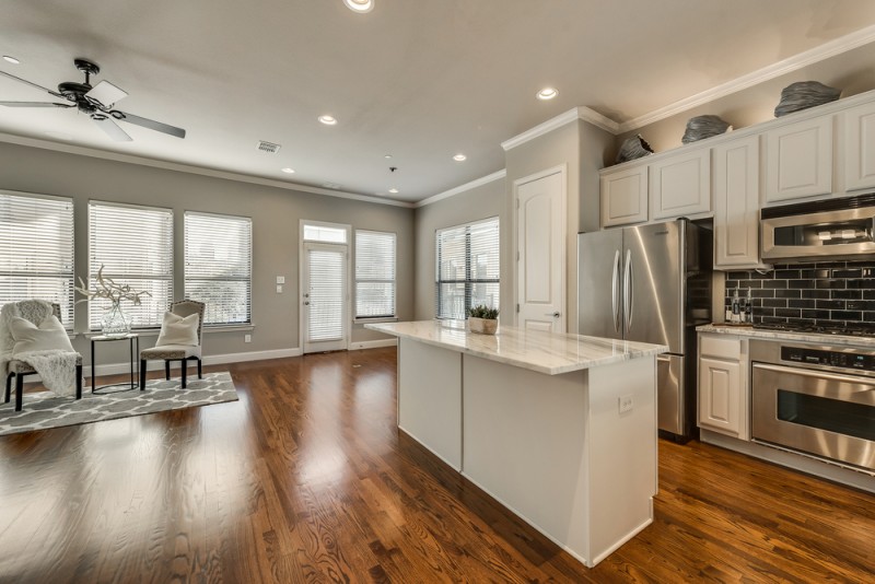    Breakfast Area and Living Space with Balcony Access 
