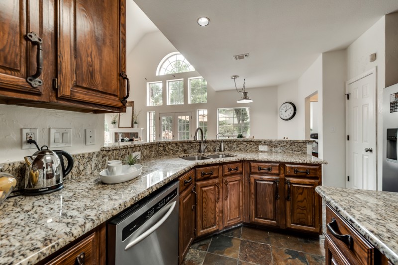    Chef s Kitchen with Stainless Steel Appliances and Open to Family Room 