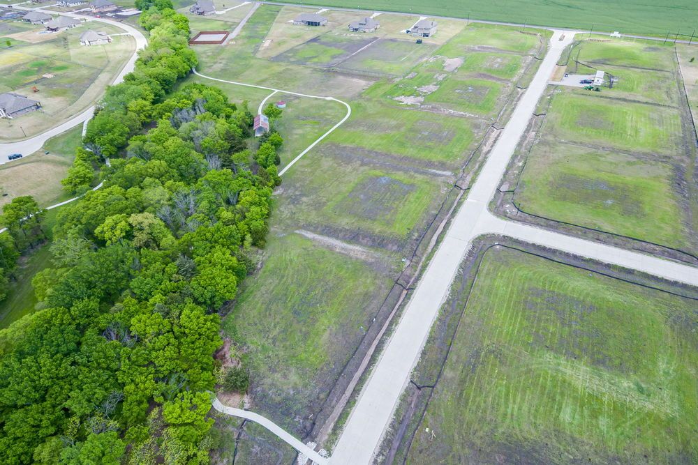    Backs to Tree Line and Walking and Jogging Trails 