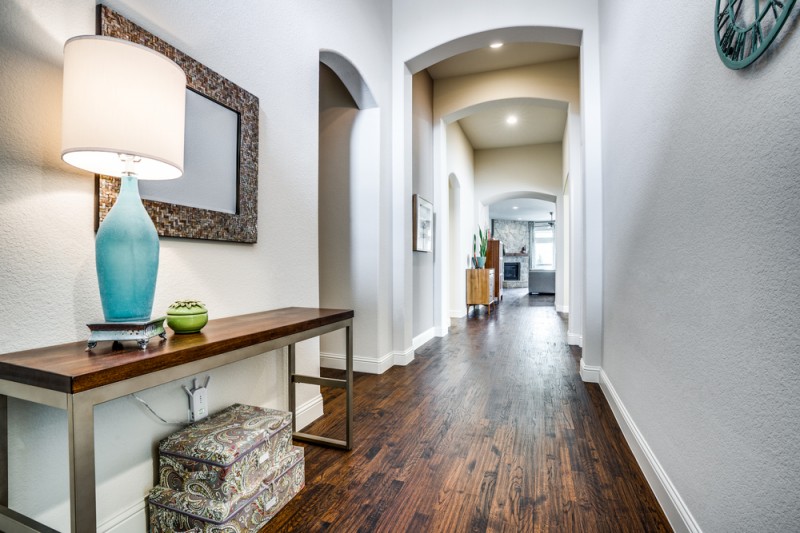    Beautiful Hand Scraped Hardwoods Stretch Through the Main Living Areas 