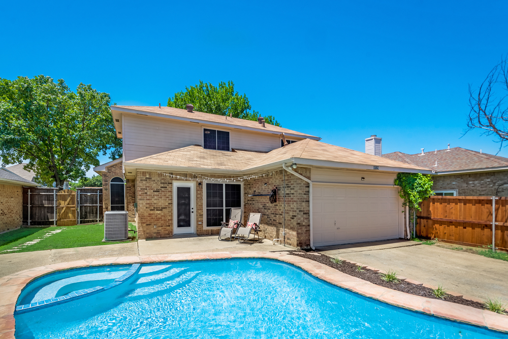    Backyard includes Open Patio and Grassy Area   