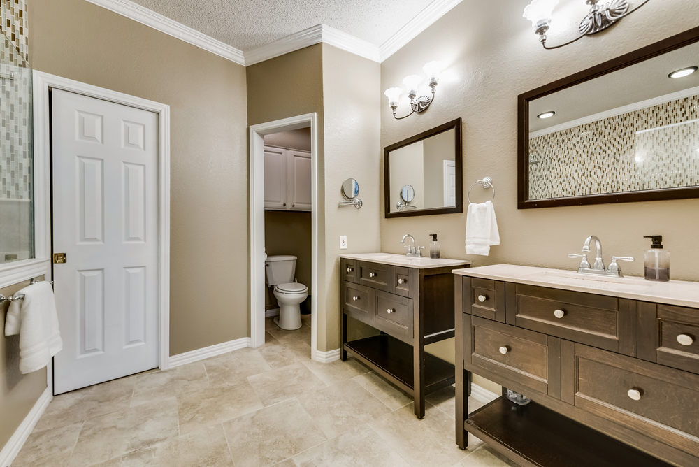    Spa Like Master Bathroom with Separate Vanity and Walk In Closet with Pocket Door   