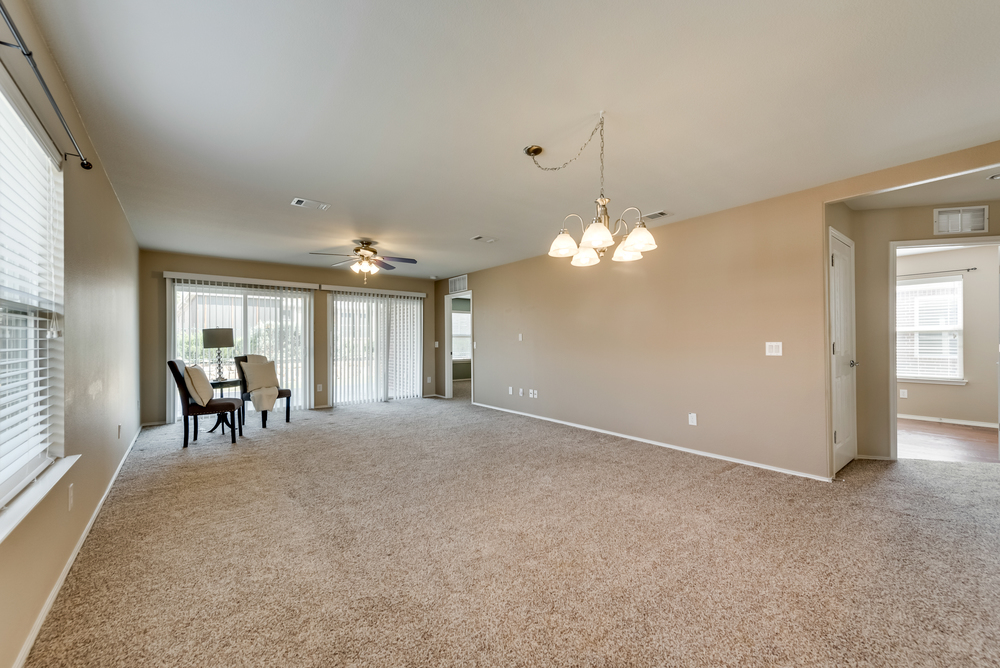    Stacked Dining Room and Family Room out to BAck Patio 