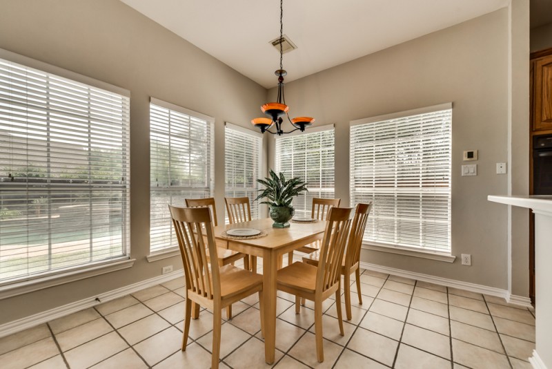    Breakfast Area surrounded by Views of the Backyard 