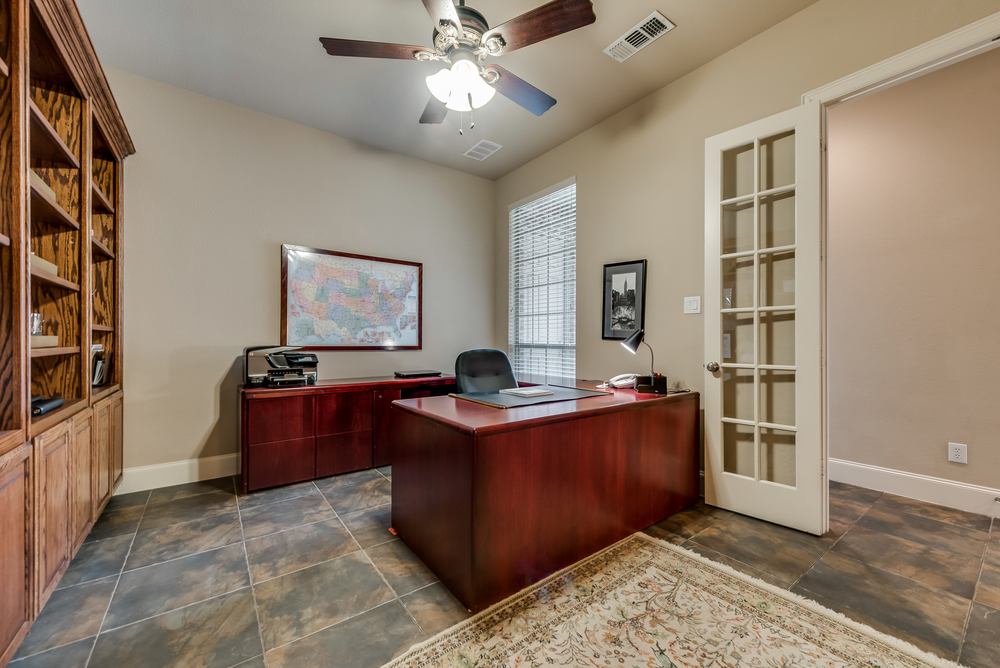    Study with Wall of Rich Built Ins and Walk In Closet 