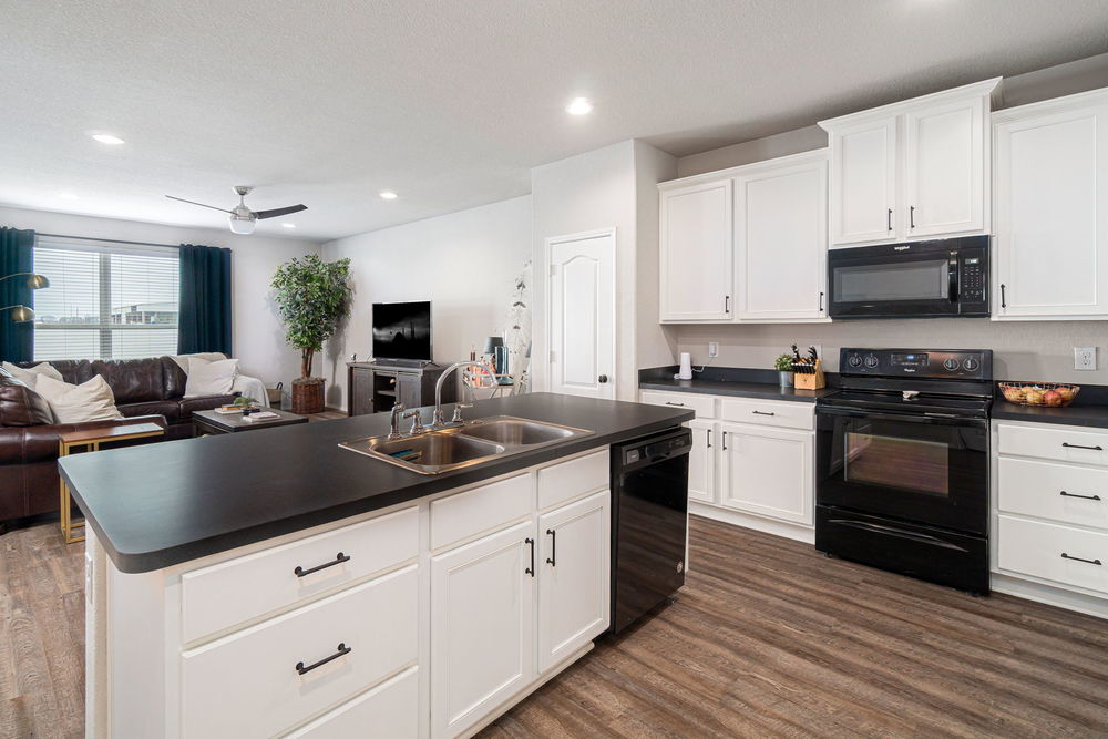    Chef s Kitchen open to Family Room and Dining Area 