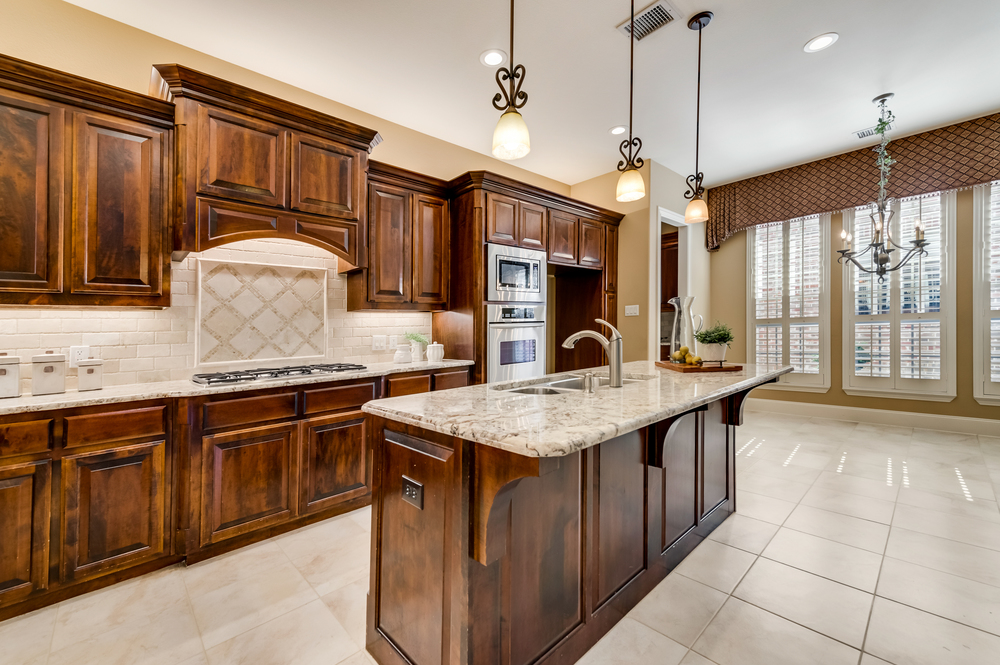    Pendant Lighting Subway Tile Backsplash and Over and Under Mount Lighting Complete the Space 