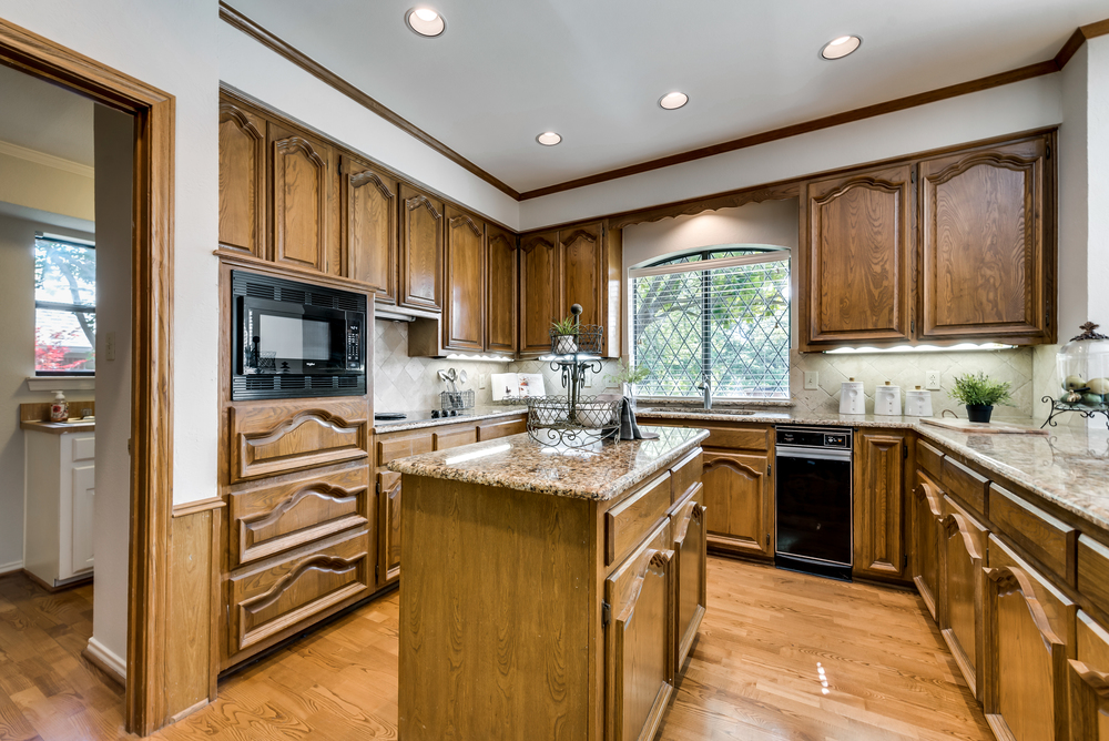    Gourmet Kitchen offers Granite Countertops Under Mount Lighting Built In Compactor and Microwave 