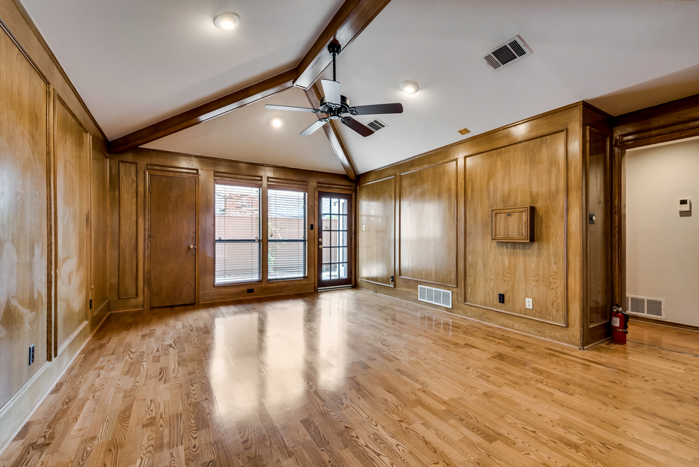    Game Room or Den has Walk In Closet and Door to Side Yard 