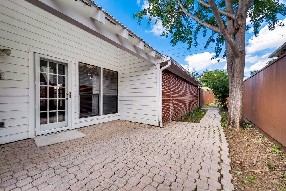    Additional Side Yard has Second Covered Patio right off Den 